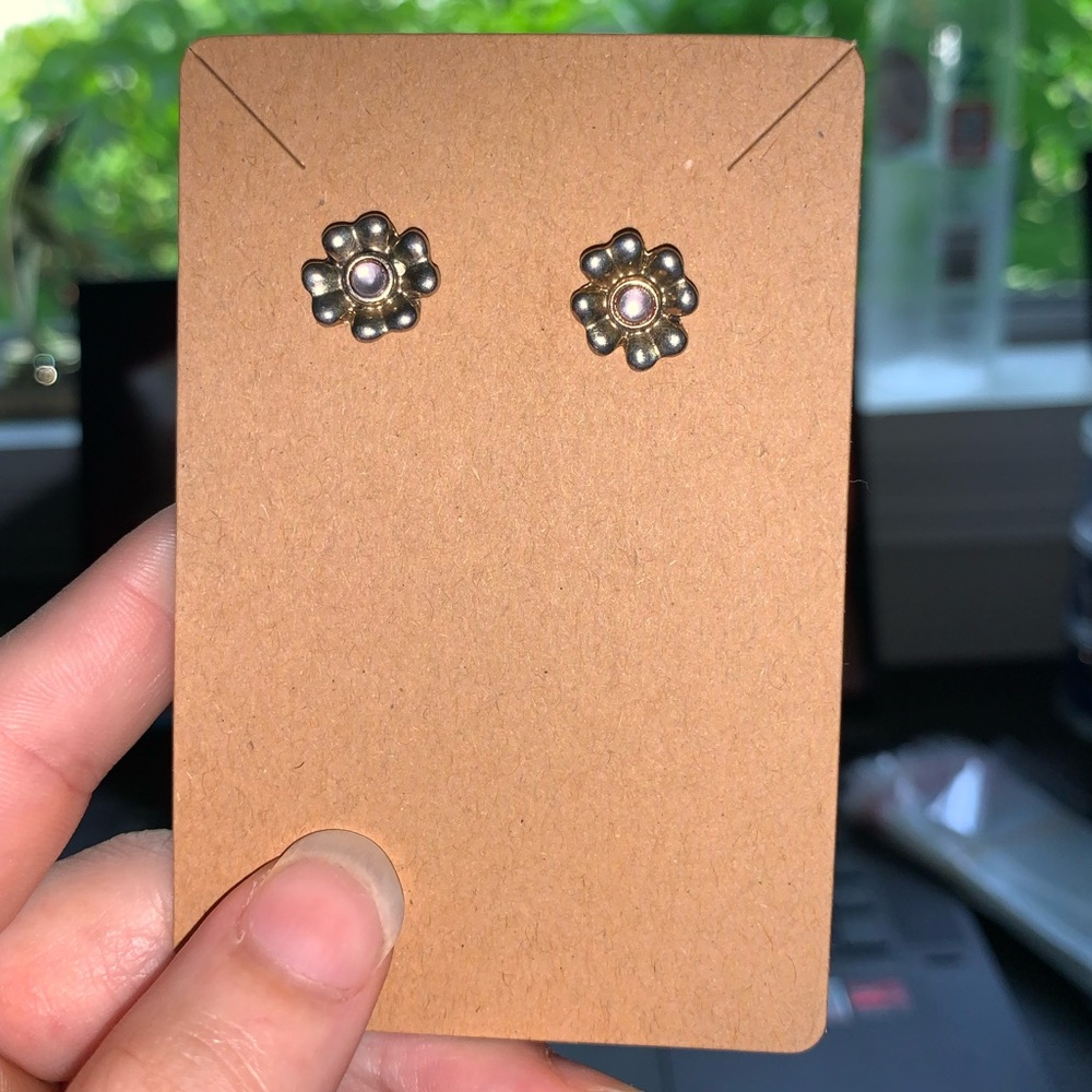 Silver Flower Earring Studs. With plastic backs.